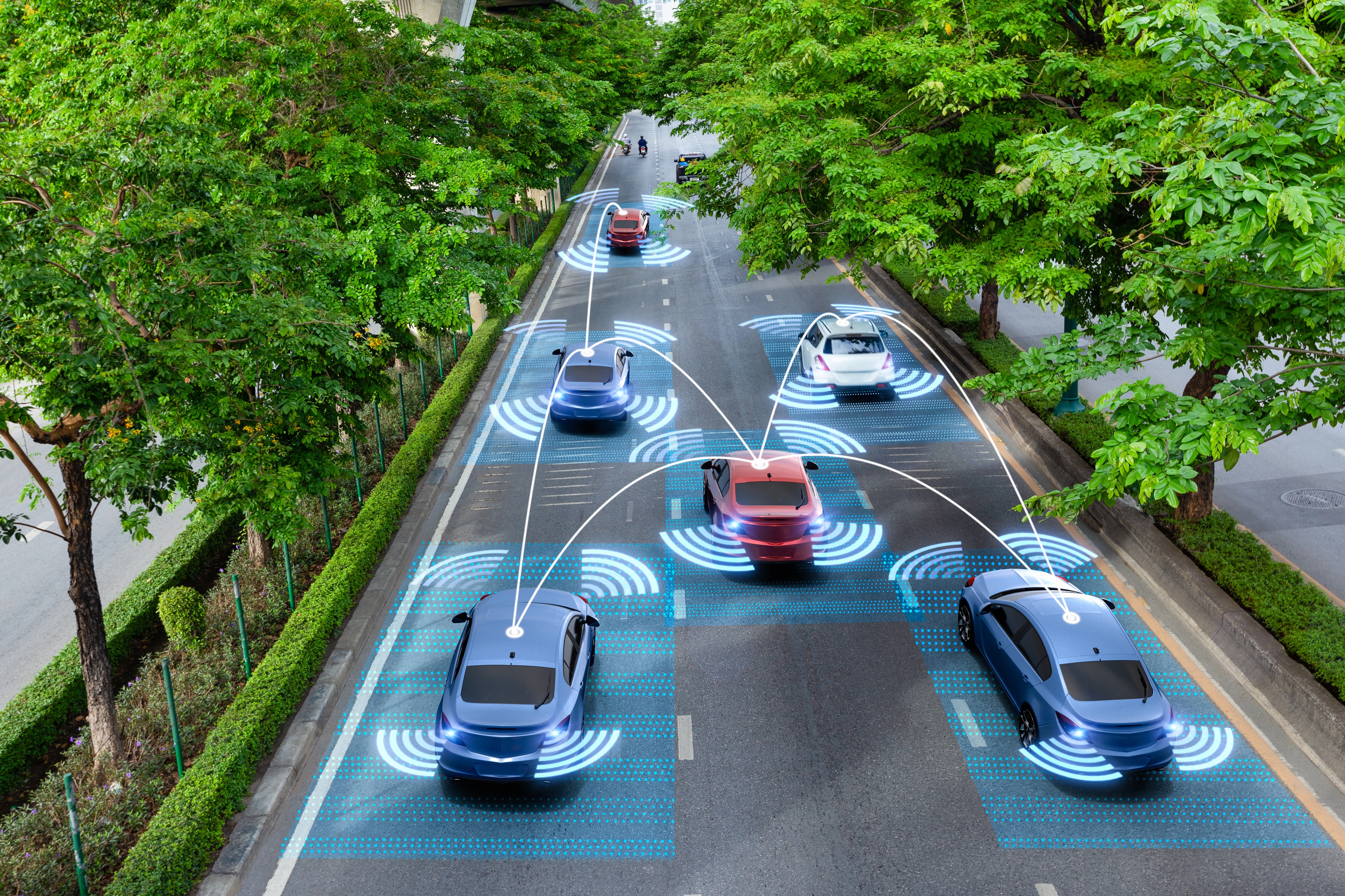 Connected cars with automatic sensor graphics on a green urban road