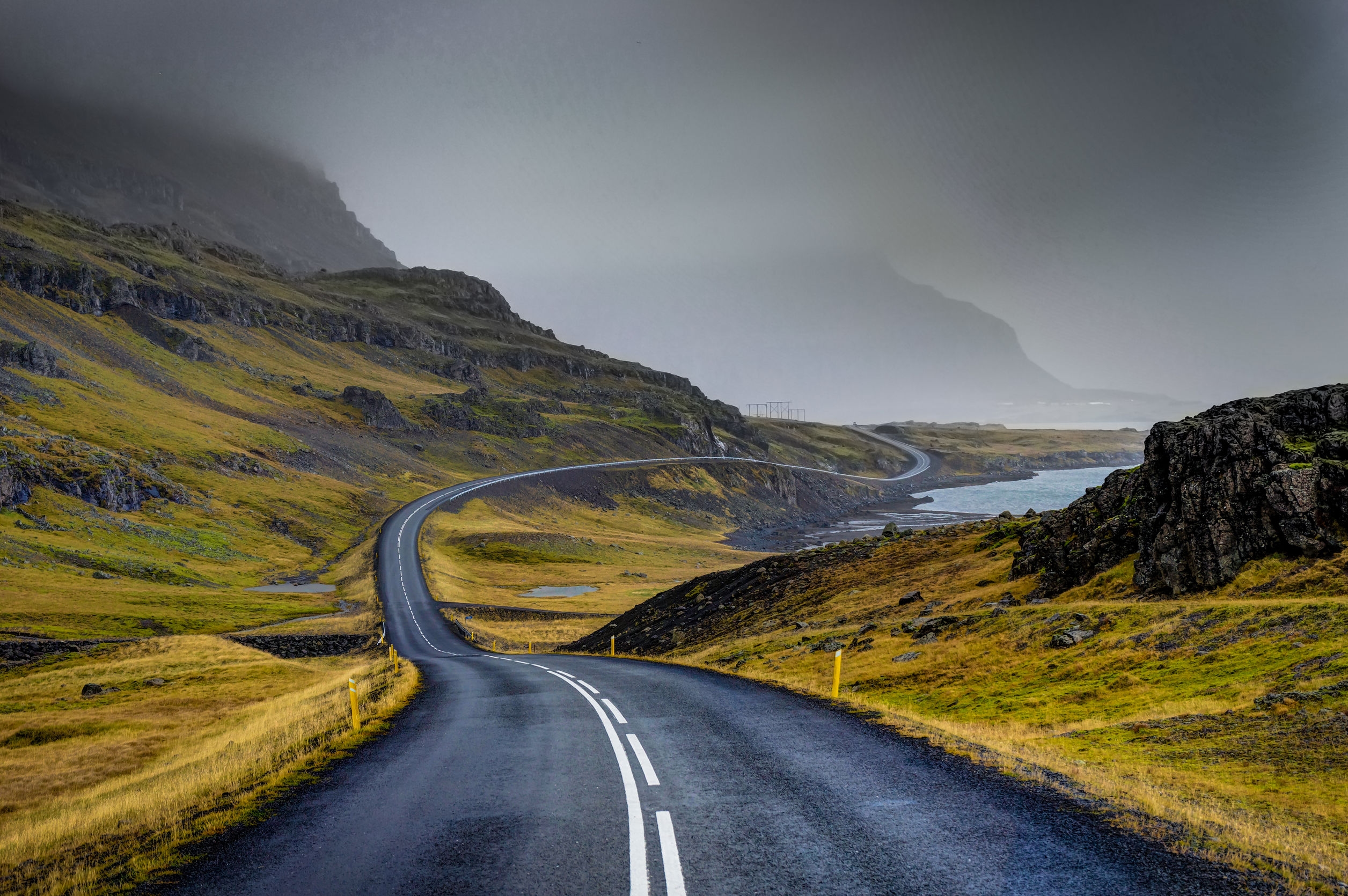 Misty mountain coastal road landscape representing the RELIANT4AD consortium
